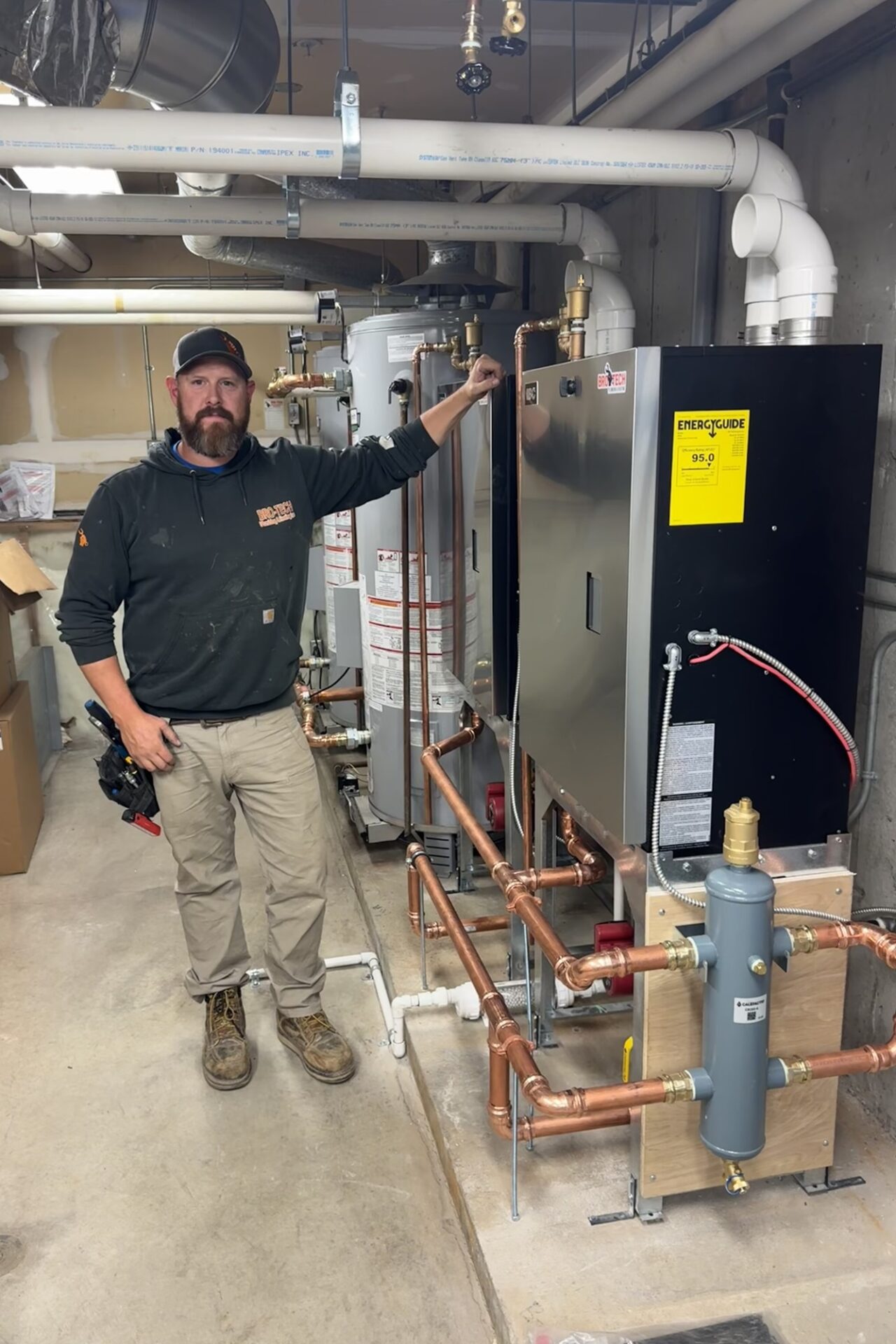 Bro-tech team member working in utility room
